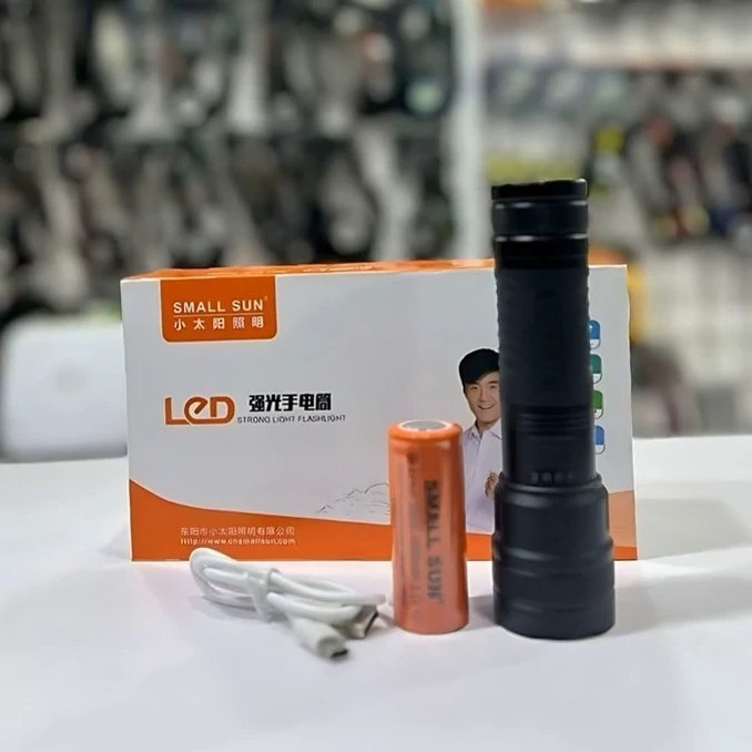چراغ قوه فلزی دستی مسافرتی جیبی شارژی چند حالته زوم دار اسمال سان مدل SMALL SUN ZY-Z08 کد ۵۱۵۸