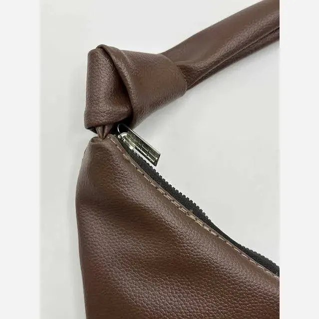 کیف دوشی زنانه چرمی بند گره ای مدل سبک و جادار ابعاد 30 در 40 سانتی متر