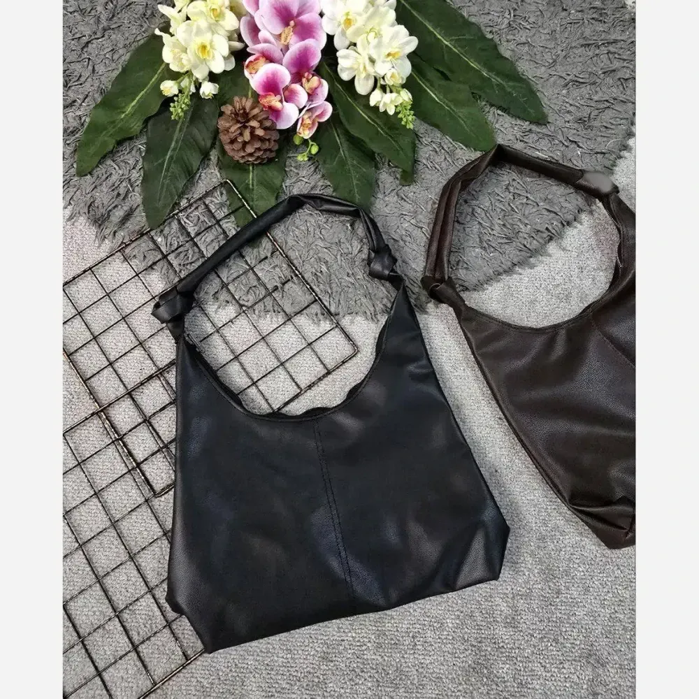 کیف دوشی زنانه چرمی بند گره ای مدل سبک و جادار ابعاد 30 در 40 سانتی متر