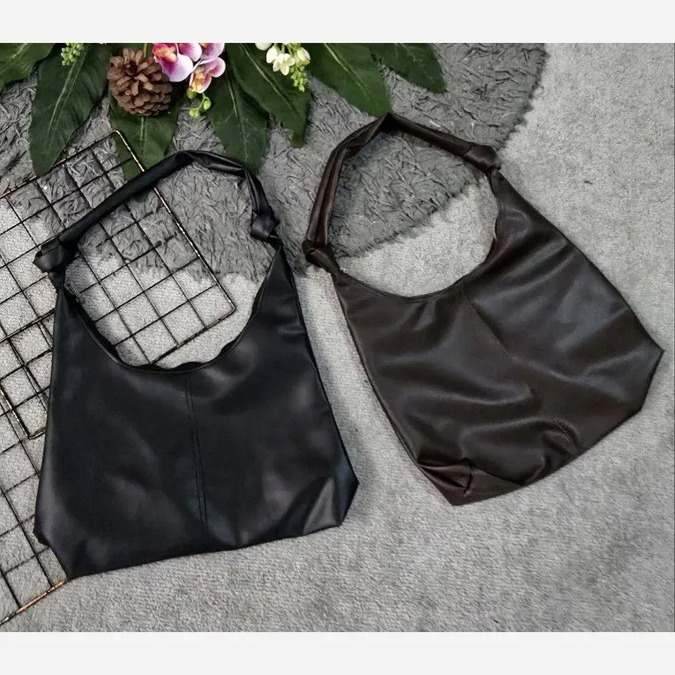 کیف دوشی زنانه چرمی بند گره ای مدل سبک و جادار ابعاد 30 در 40 سانتی متر