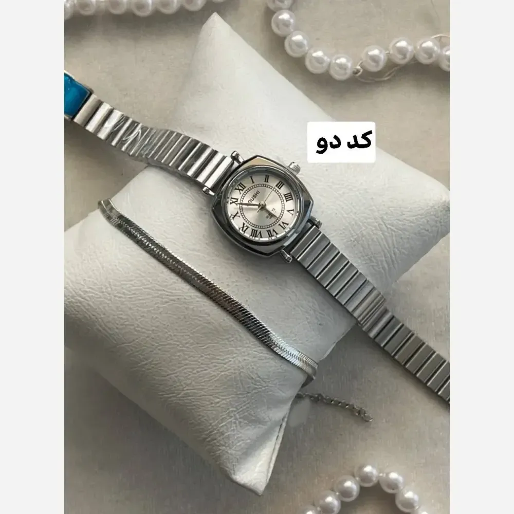 ست ساعت زنانه کوشی بند کرکره ای و دستبند ماری استیل با جعبه کادویی