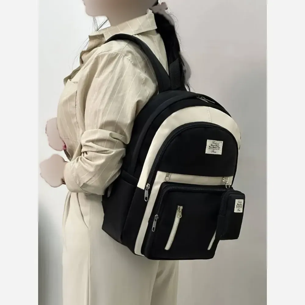 کوله پشتی زرین دیبا ضد آب با کیفیت عالی و سه زیپ و جای قمقمه اندازه 40*28 سانت مشکی کرم و تمام مشکی