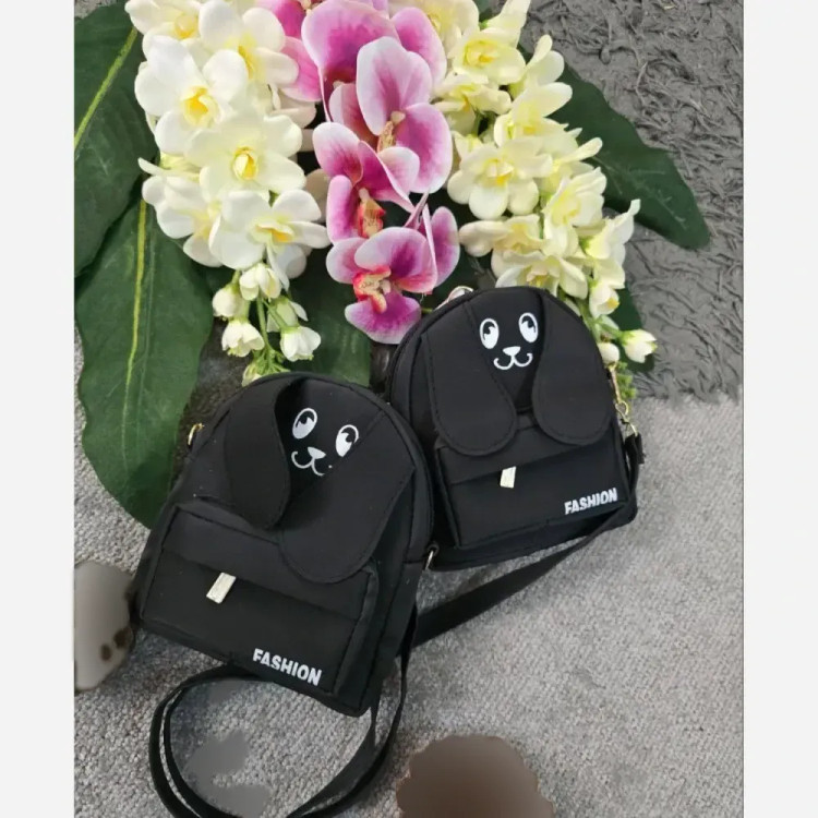 کیف چرمی مژگان زنانه جادار با بند بلند