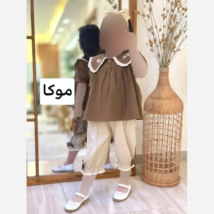 ست تیشرت و شلوار بچگانه پروانه نگین دار مشکی مناسب 7 تا 13 سال جنس پنبه و دورس پنبه
