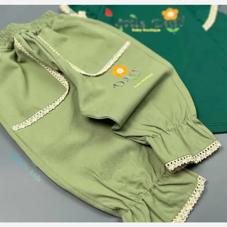 ست بلوز و شلوار بچگانه مدل گل مربع جنس پنبه دورس رنگ مشکی سایز 45 تا 60